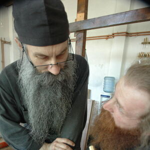 Father Avakum teaching Father Dimitrije wood carving 3