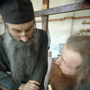 Father Avakum teaching Father Dimitrije wood carving 4