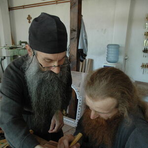 Father Avakum teaching Father Dimitrije wood carving 5