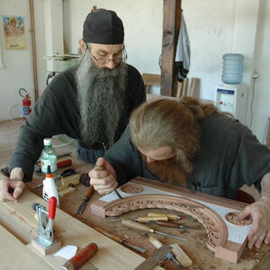 Father Avakum teaching Father Dimitrije wood carving 9