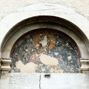 Lunette of the sauthern entrance with painted representation of Christ