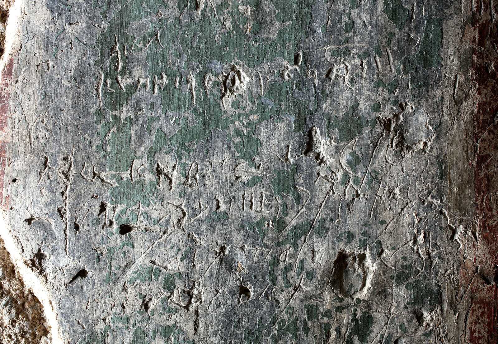 Engraved inscription besides of the entrance of diaconicon, detail