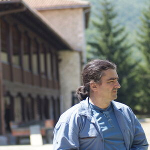 Nenad walks around the churchyard