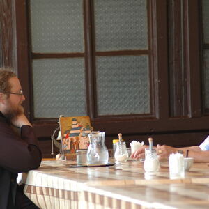 Father Sava talking to the visitor