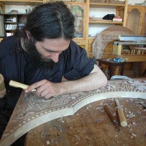 Monk carving wood 1