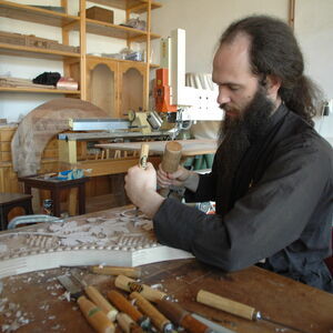 Monk carving wood 1