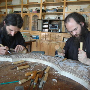 Monks carving wood 2