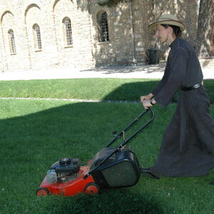 Mowing the grass in the churchyard