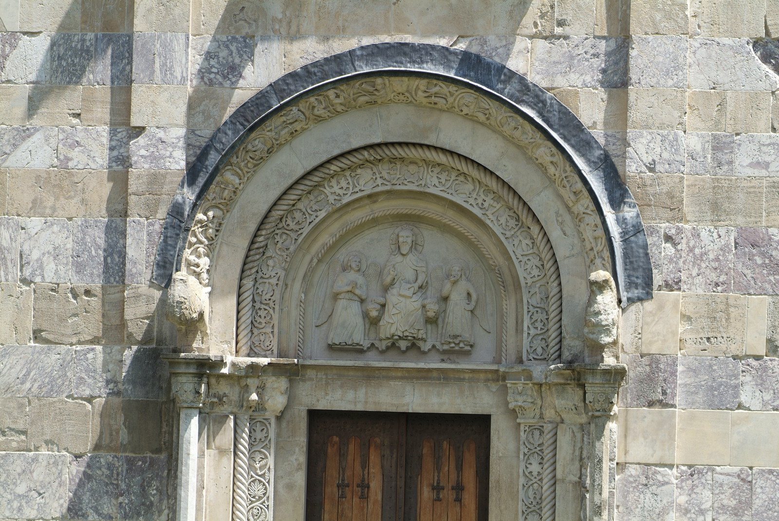 Relief above the western portal: Christ with Angels 2