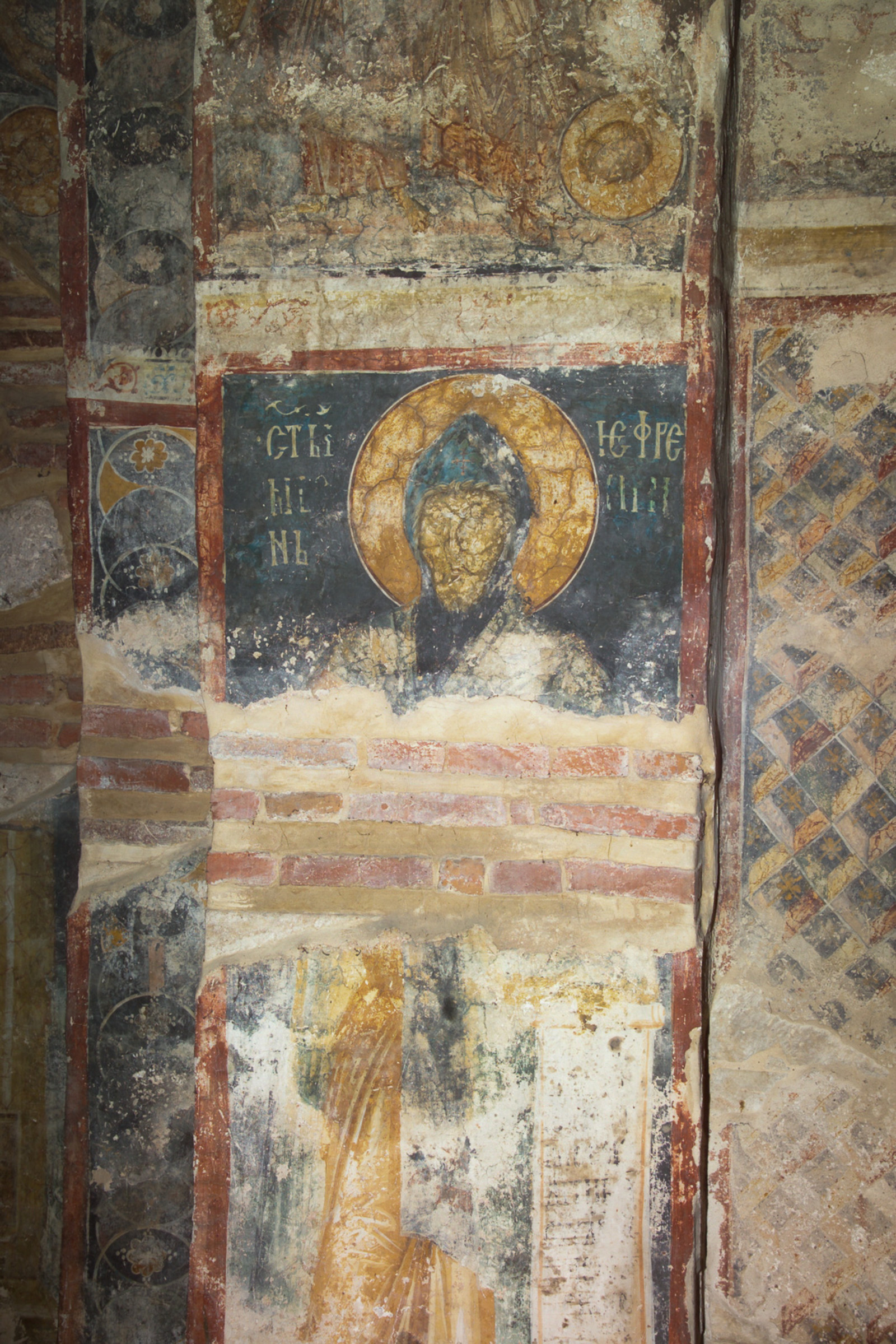 43 St. Ephrem, holding an open written scroll, damaged