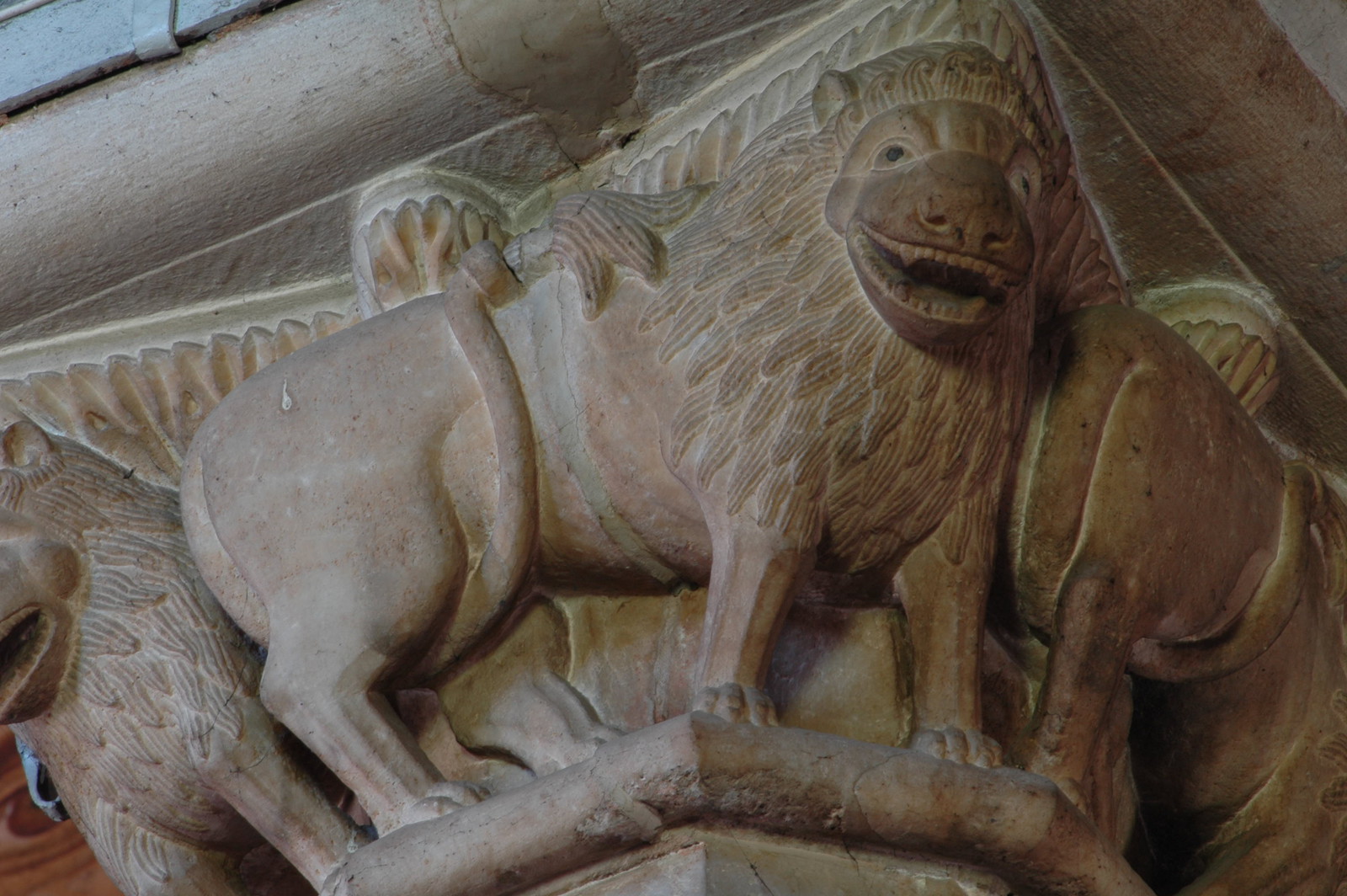 Lions at the narthex column capital 10