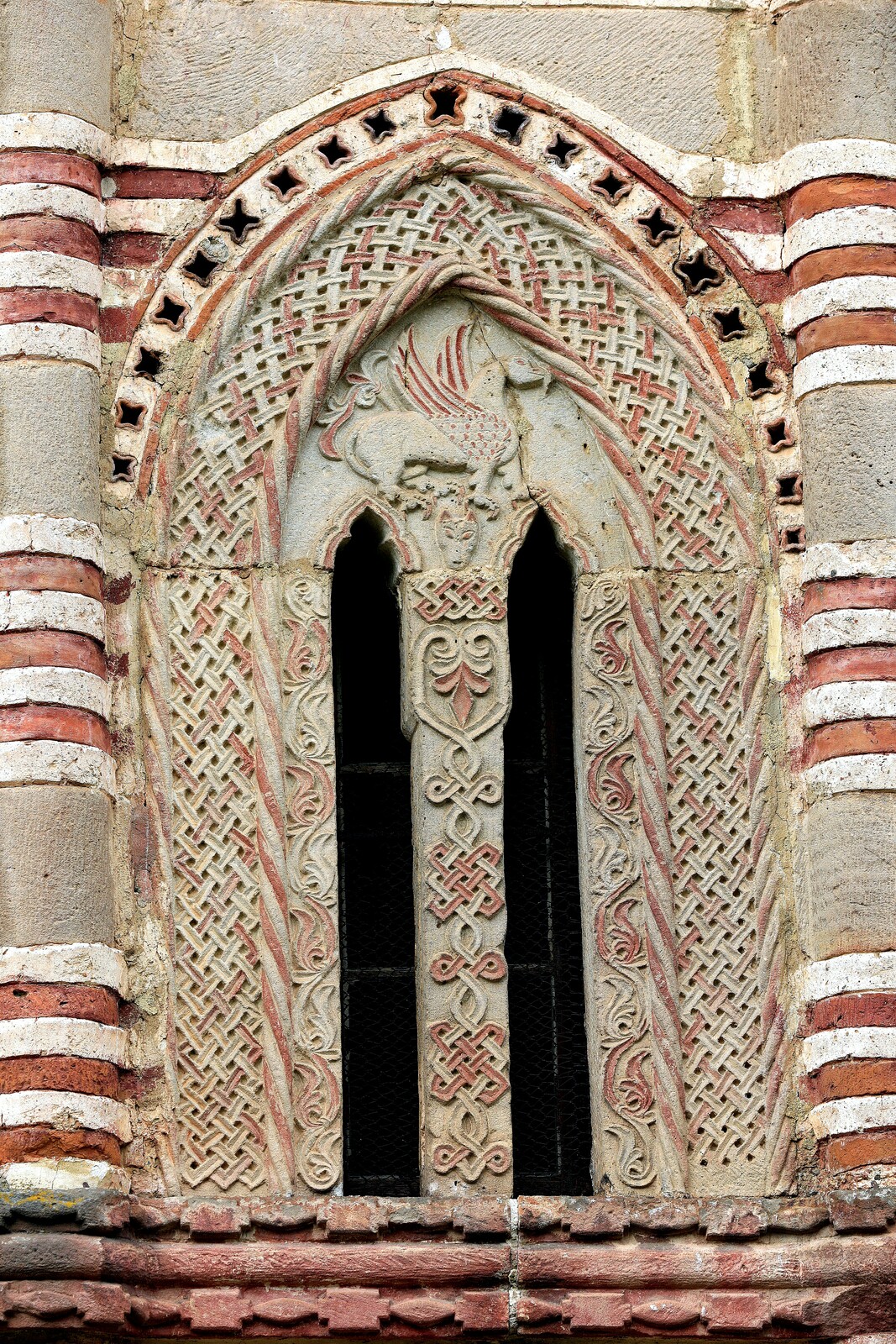 Bifora on the South chantry with a Representation of a Griffin