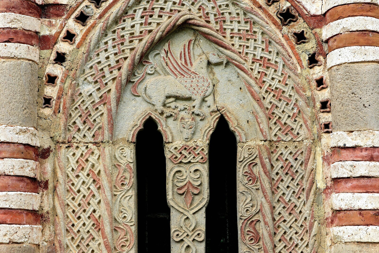 Bifora on the South chantry with a Representation of a Griffin, detail