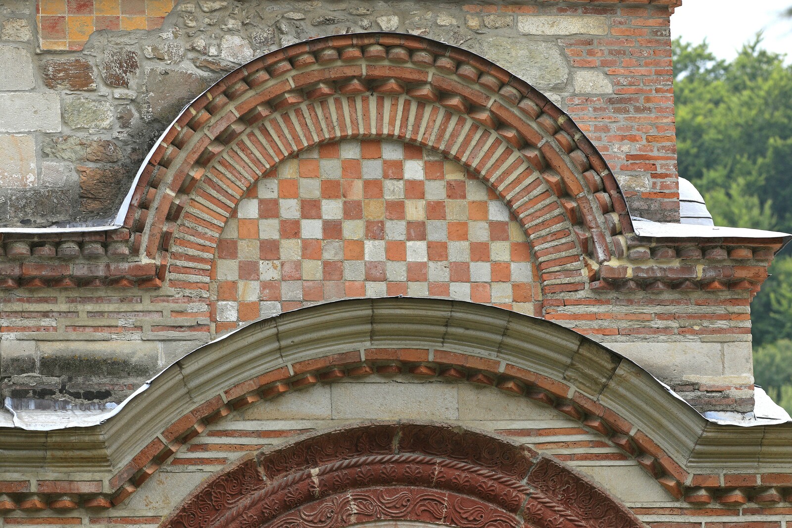 Tympanum with Chessboard Motif