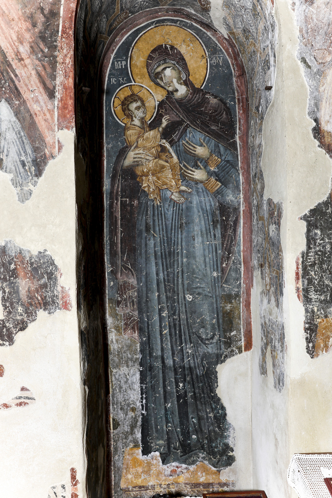 Mother of God Tricherousa, a fresco-icon