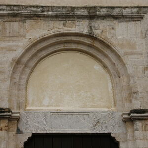 Architrave and lunette of the western portal of church