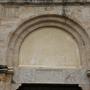 Architrave and lunette of the western portal of the church
