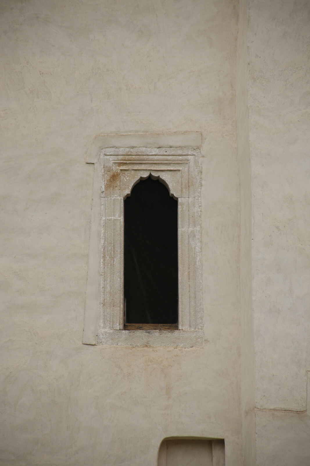 Window on the southern wall of the narthex