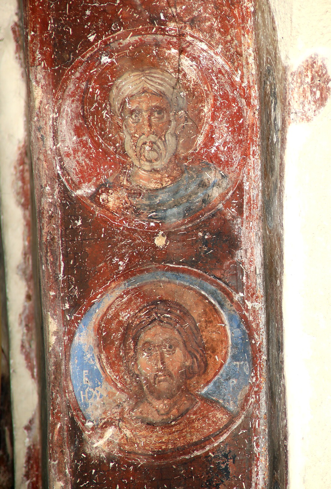Unidentified martyr and St. Victor in medallions