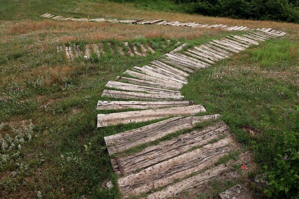 Wooden path to the church