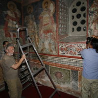 Nenad takes photos while Meda and Zoran help with the equipment