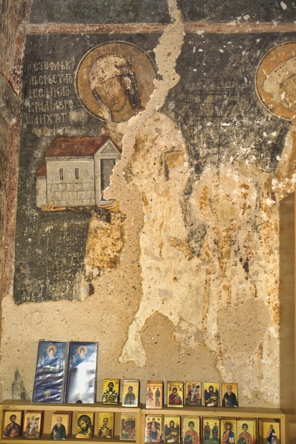 Pillars of St. George Chapel's west wall with portraits of Serbian medieval rulers