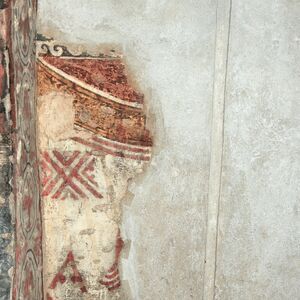 Fragment of painted drapery, socle