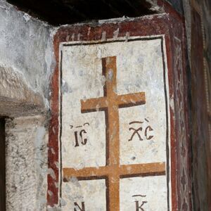 Cross with chrystogram, north doorjamb