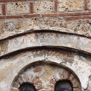 Fresco fragments in the lunette, western facade