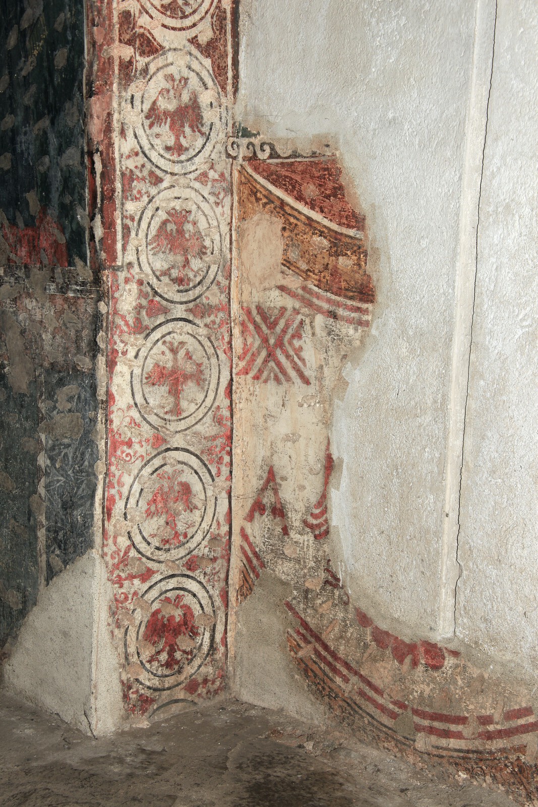 Ornament and a fragment of painted drapery, socle