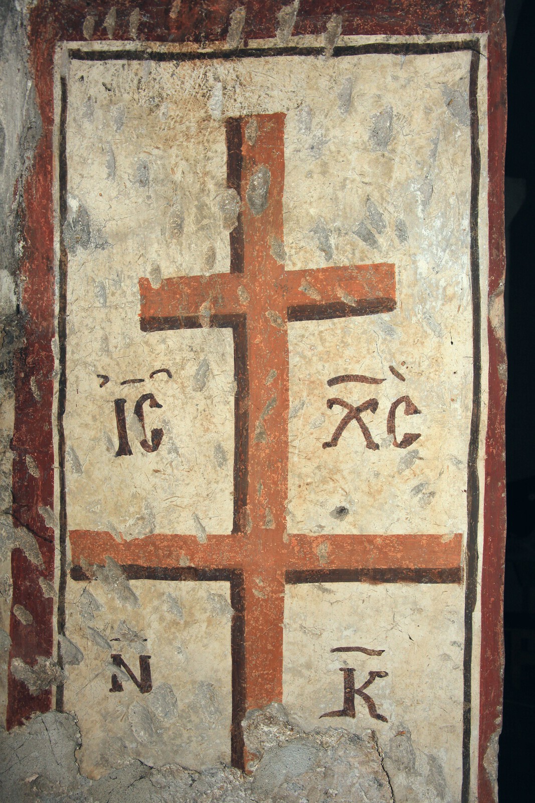 Cross with chrystogram, north doorjamb