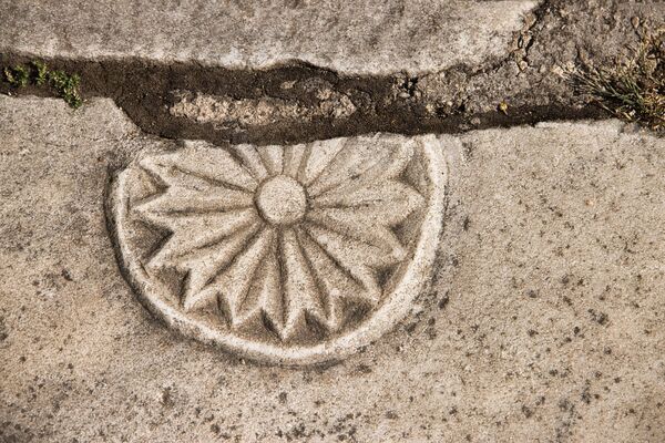Decorated stone slab