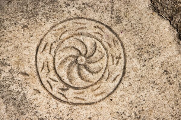 Decorated stone slab