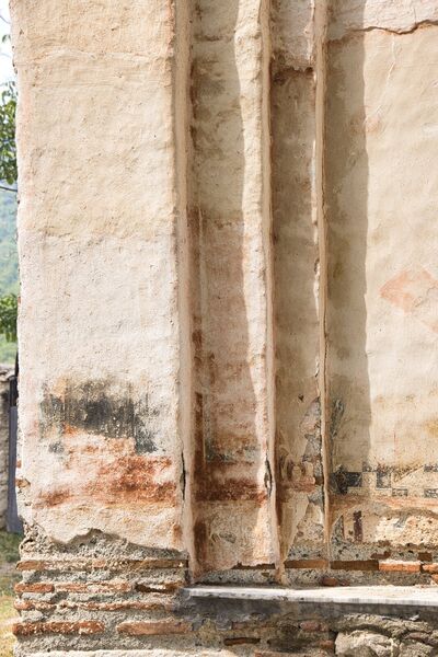 Remains of two standing figures and one stylite