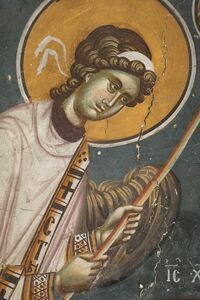 An Angel Deacon holding Rhpidion