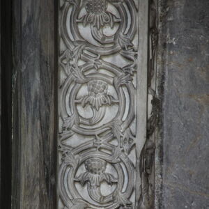 Detail of the carved floral interwieving on the north doorpost