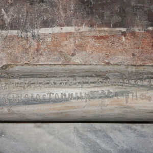Engraved inscription in the cornice of the dado on south wall of narthex