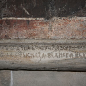 Engraved inscription in the cornice of the dado on south wall of narthex