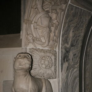 A sculpture of the lioness on the capital on the north side of the portal