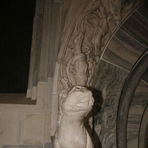 A sculpture of the lioness on the capital on the north side of the portal