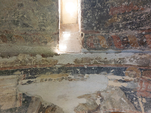 Detail of the ornament at the base of the tambour and remains of the inscription in the dome ring