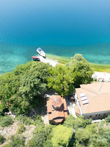 View from above of the church, the boarding house and the pier